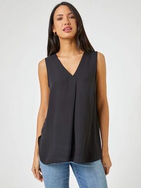 She + Sky viola woven top size medium. Very flattering.